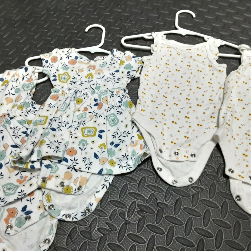 Two sets of twin outfits